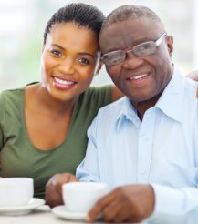 caregiver and elderly smiling